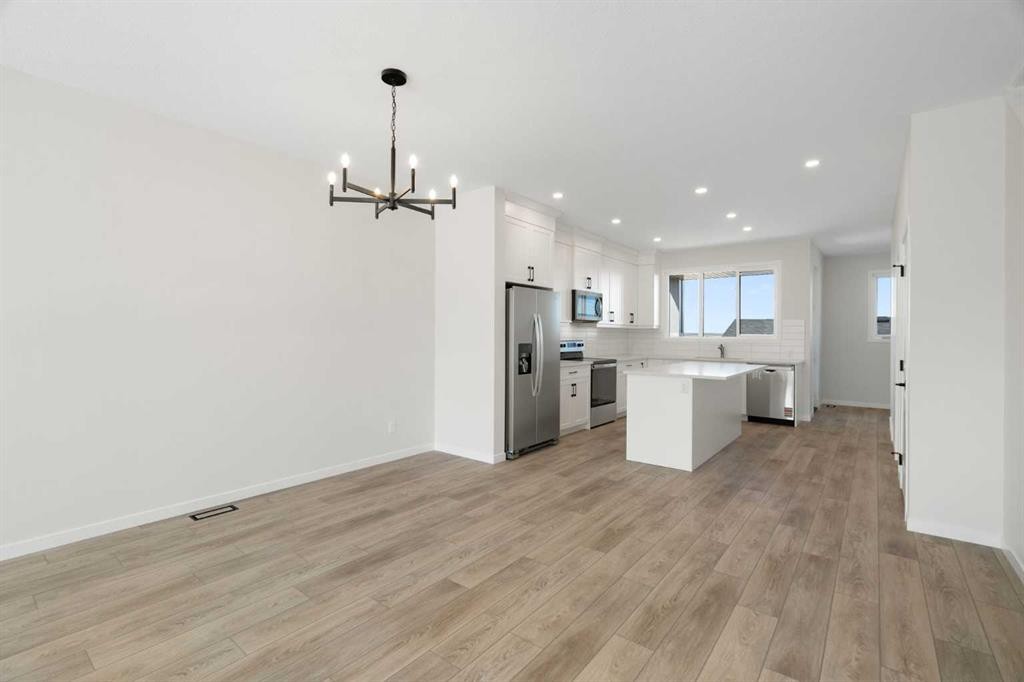 75 Bluerock Terrace Sw, Calgary, AB - Indoor Photo Showing Kitchen
