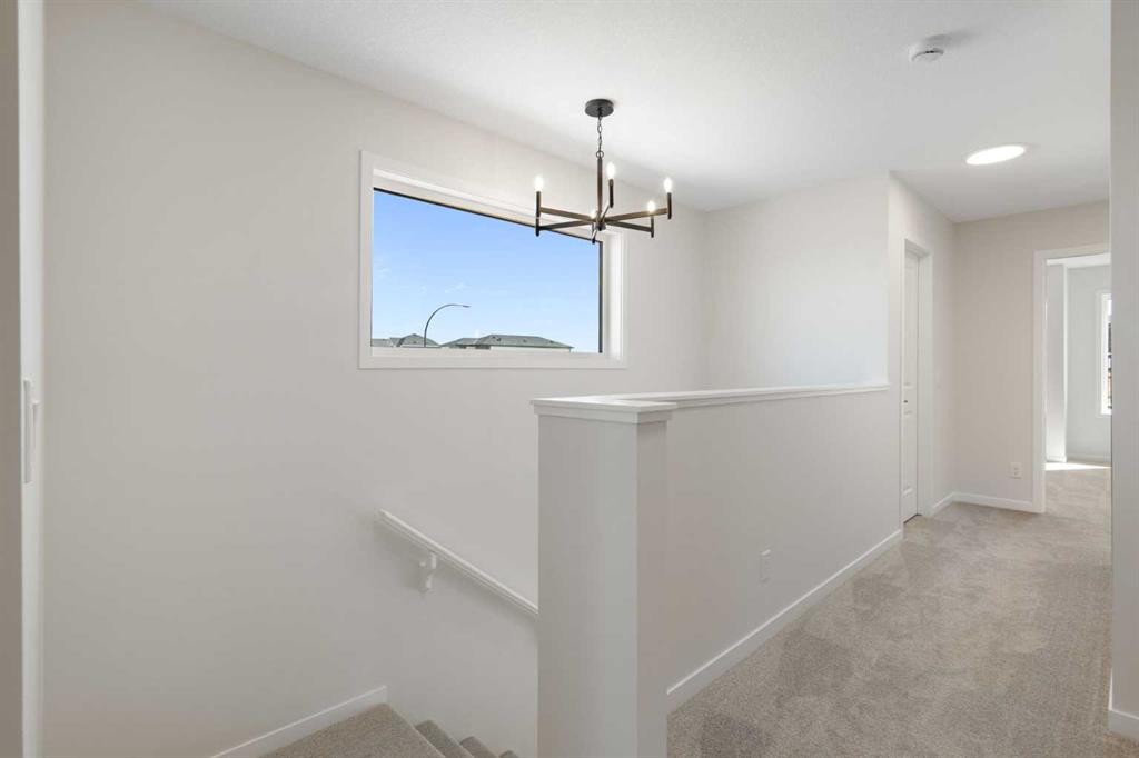 75 Bluerock Terrace Sw, Calgary, AB - Indoor Photo Showing Other Room
