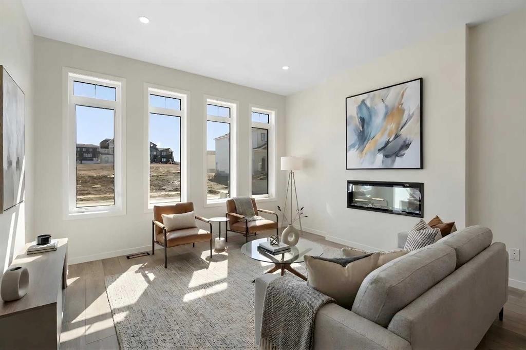 75 Bluerock Terrace Sw, Calgary, AB - Indoor Photo Showing Living Room With Fireplace