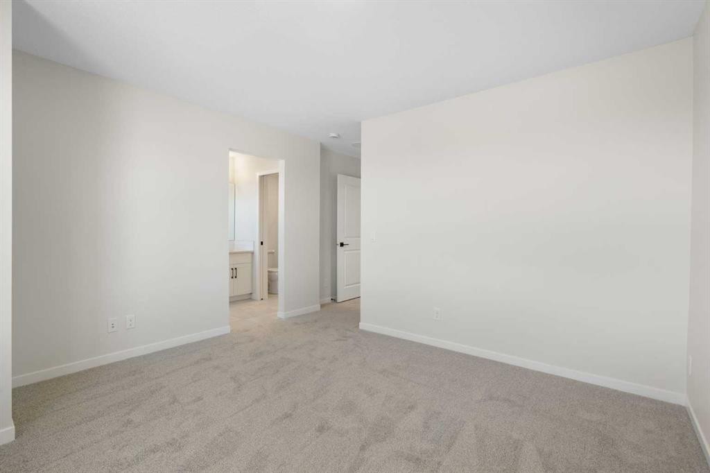 75 Bluerock Terrace Sw, Calgary, AB - Indoor Photo Showing Other Room