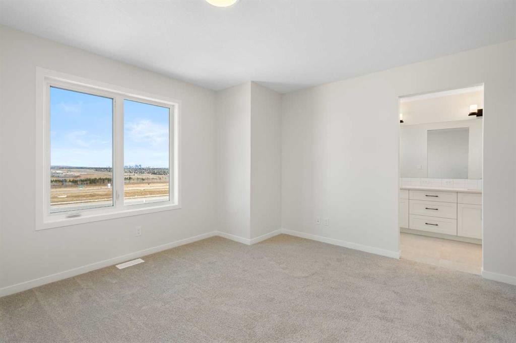 75 Bluerock Terrace Sw, Calgary, AB - Indoor Photo Showing Other Room