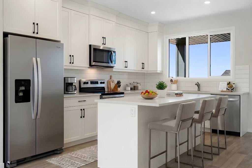 75 Bluerock Terrace Sw, Calgary, AB - Indoor Photo Showing Kitchen With Upgraded Kitchen