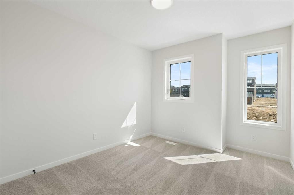 75 Bluerock Terrace Sw, Calgary, AB - Indoor Photo Showing Other Room