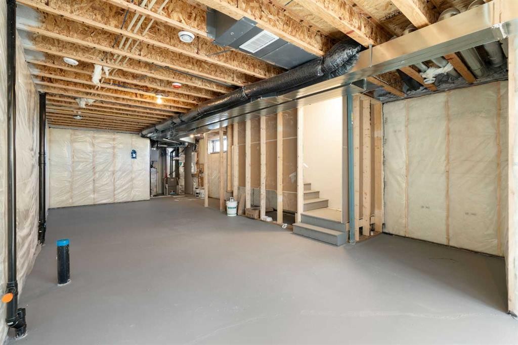 75 Bluerock Terrace Sw, Calgary, AB - Indoor Photo Showing Basement