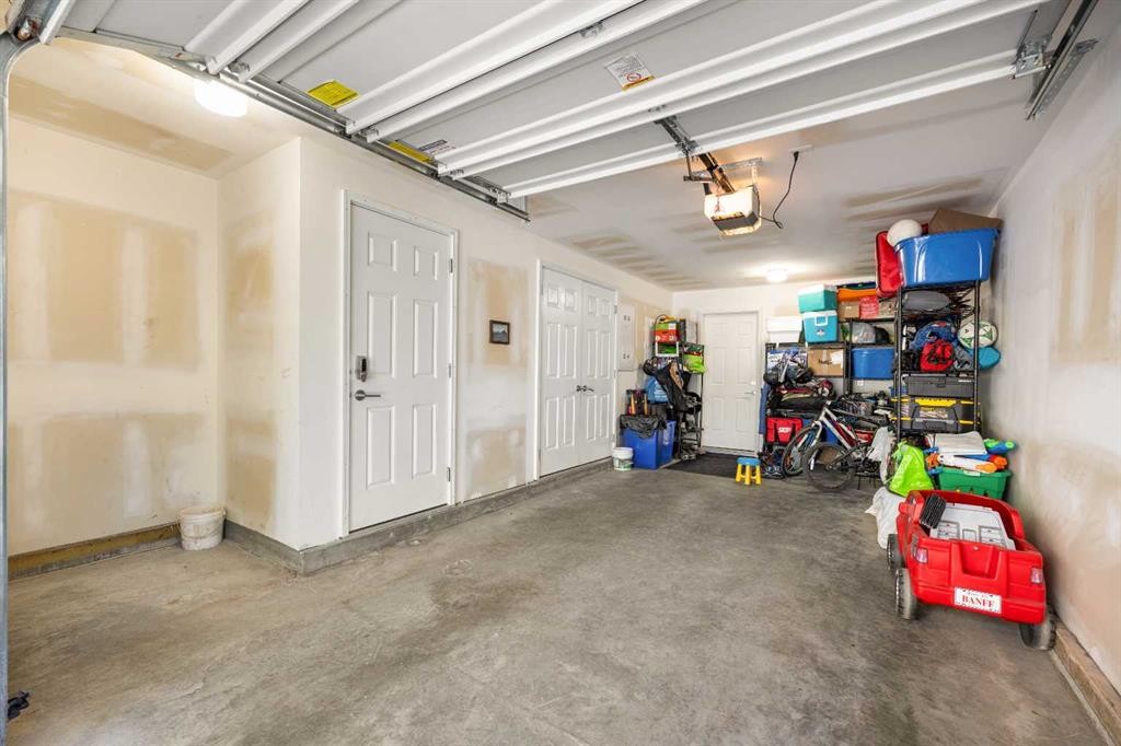 104 Sherwood Lane Nw, Calgary, AB - Indoor Photo Showing Garage