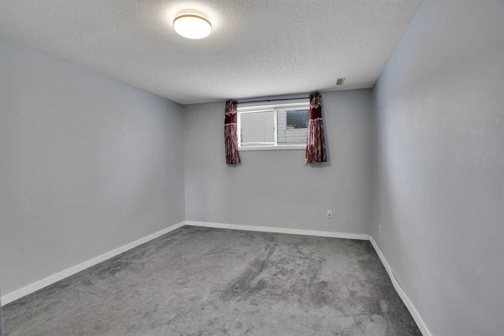 193 Martindale Drive Ne, Calgary, AB - Indoor Photo Showing Other Room