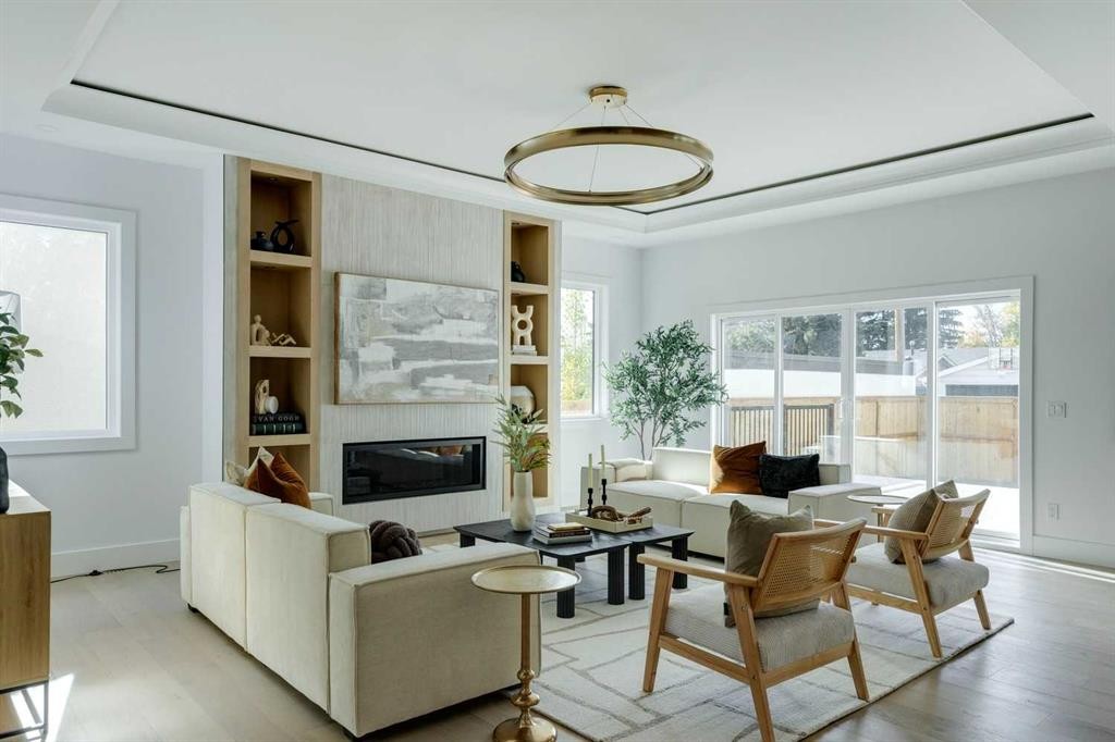 3444 Lane Crescent Sw, Calgary, AB - Indoor Photo Showing Living Room With Fireplace