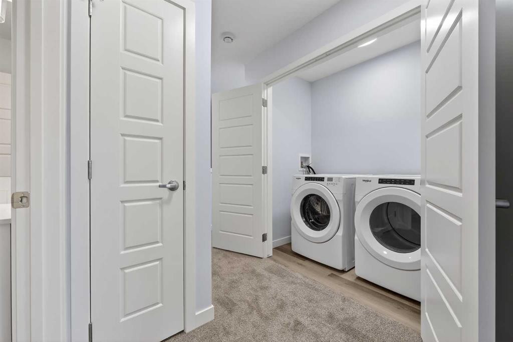 107-1750 Rangeview Drive Se, Calgary, AB - Indoor Photo Showing Laundry Room