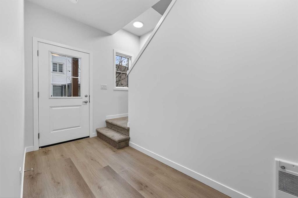 107-1750 Rangeview Drive Se, Calgary, AB - Indoor Photo Showing Other Room