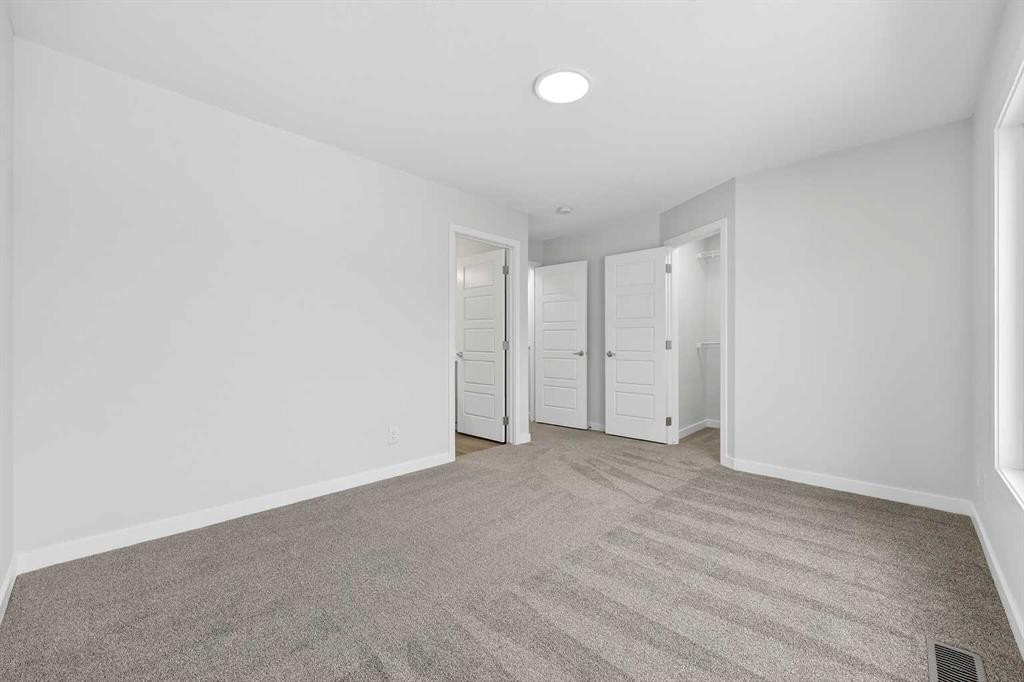 412-1750 Rangeview Drive Se, Calgary, AB - Indoor Photo Showing Other Room