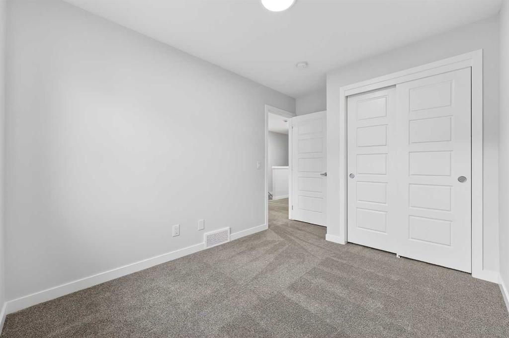 412-1750 Rangeview Drive Se, Calgary, AB - Indoor Photo Showing Other Room
