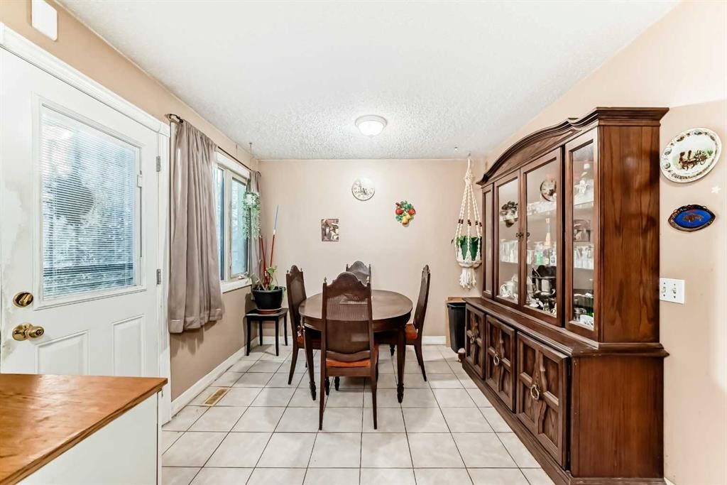 2319 56 Street Ne, Calgary, AB - Indoor Photo Showing Dining Room