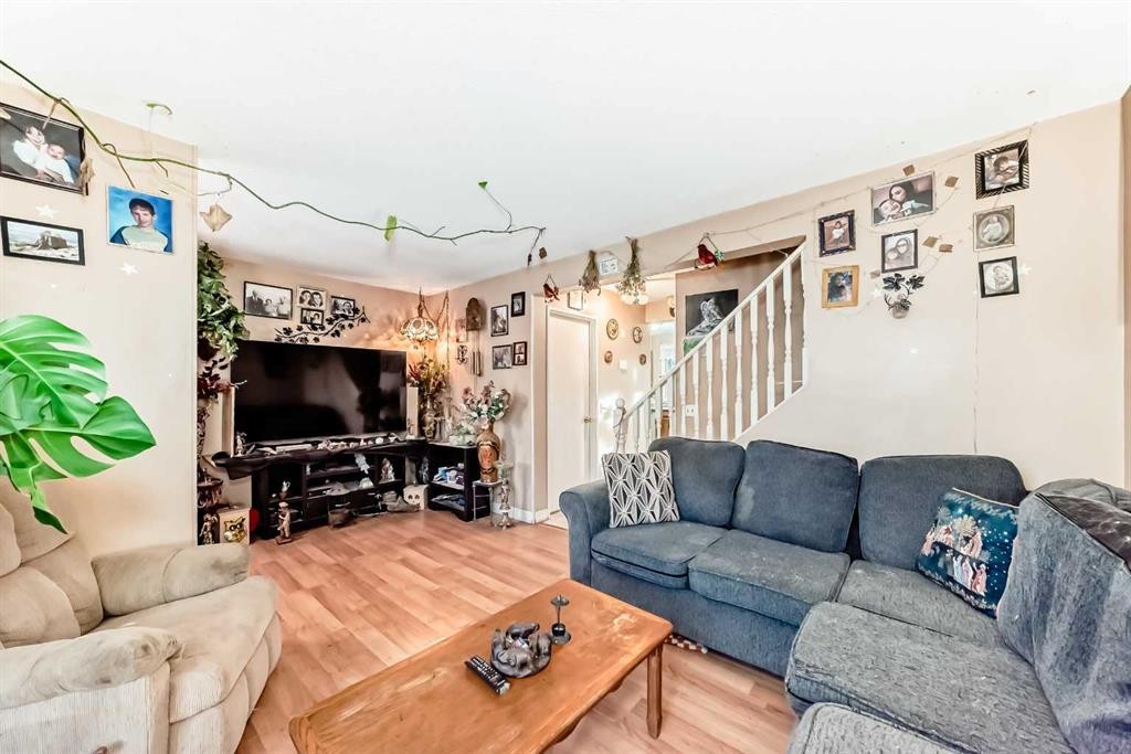 2319 56 Street Ne, Calgary, AB - Indoor Photo Showing Living Room