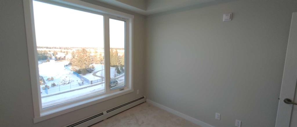 403-660 Shawnee Square Sw, Calgary, AB - Indoor Photo Showing Other Room