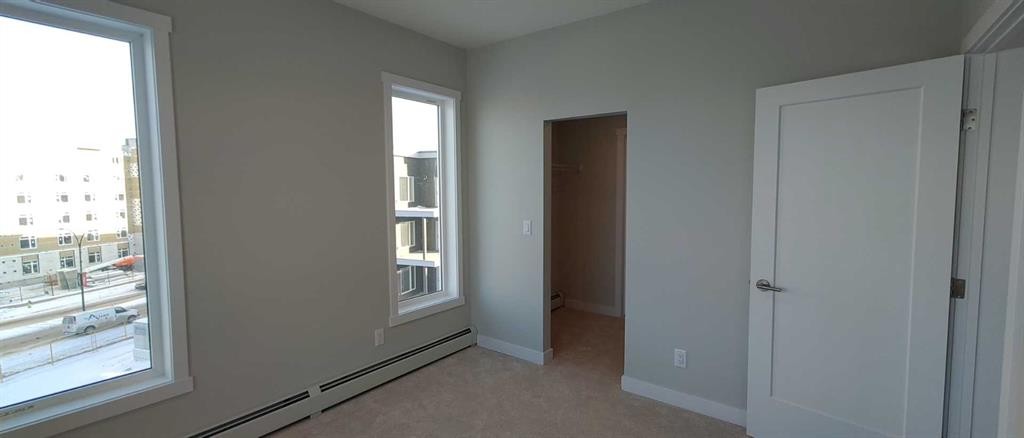 403-660 Shawnee Square Sw, Calgary, AB - Indoor Photo Showing Other Room