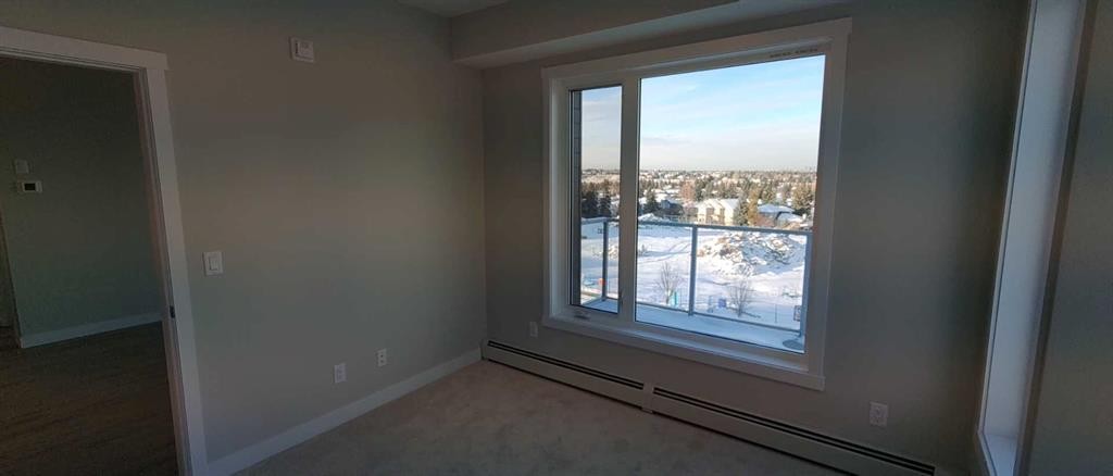 403-660 Shawnee Square Sw, Calgary, AB - Indoor Photo Showing Other Room
