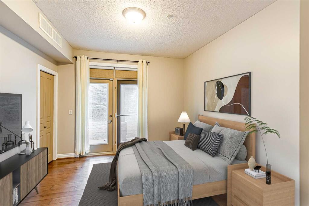 3-148 Rockyledge View Nw, Calgary, AB - Indoor Photo Showing Bedroom