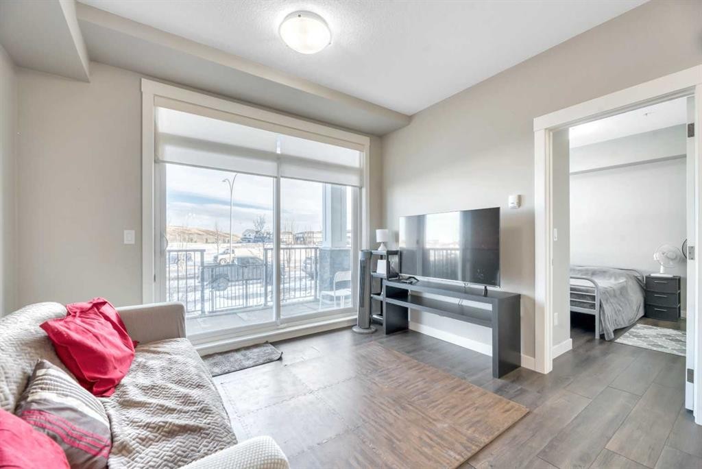 119-10 Walgrove Walk Se, Calgary, AB - Indoor Photo Showing Living Room