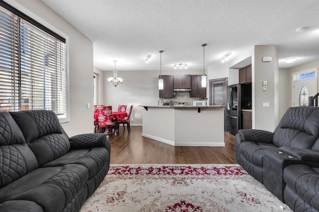 1564 Copperfield Boulevard Se, Calgary, AB - Indoor Photo Showing Living Room