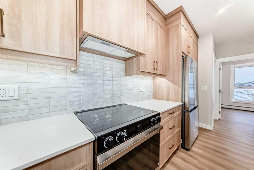 8206-1802 Mahogany Boulevard Se, Calgary, AB - Indoor Photo Showing Kitchen With Upgraded Kitchen
