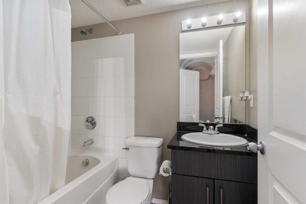 203-5 Saddlestone Way Ne, Calgary, AB - Indoor Photo Showing Bathroom