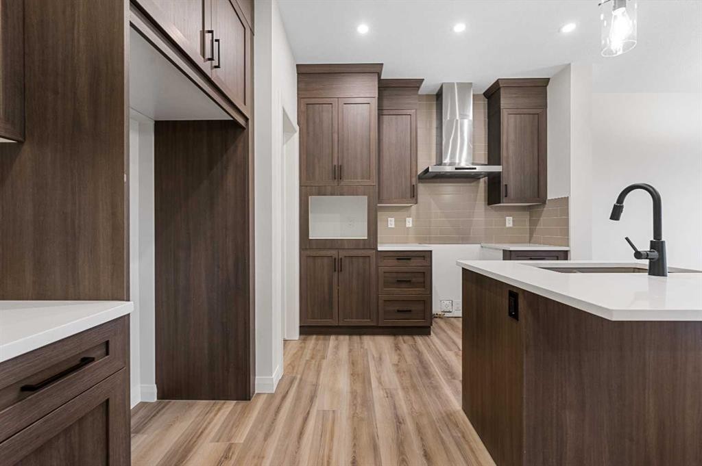 72 Dawson Wharf Mount, Chestermere, AB - Indoor Photo Showing Kitchen With Upgraded Kitchen