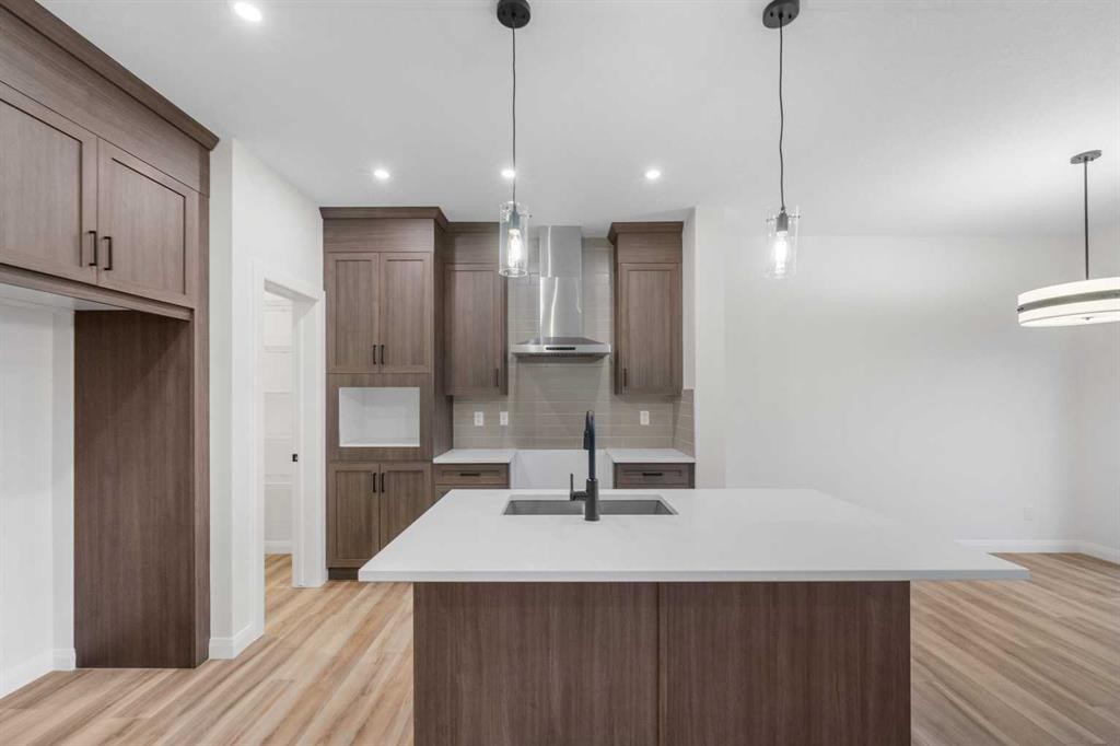 72 Dawson Wharf Mount, Chestermere, AB - Indoor Photo Showing Kitchen With Upgraded Kitchen