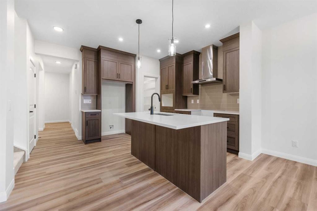 72 Dawson Wharf Mount, Chestermere, AB - Indoor Photo Showing Kitchen With Upgraded Kitchen