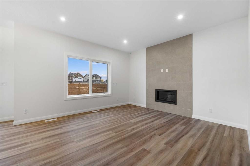 72 Dawson Wharf Mount, Chestermere, AB - Indoor With Fireplace