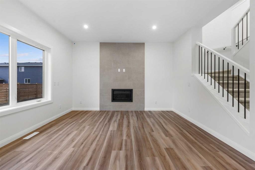 72 Dawson Wharf Mount, Chestermere, AB - Indoor With Fireplace