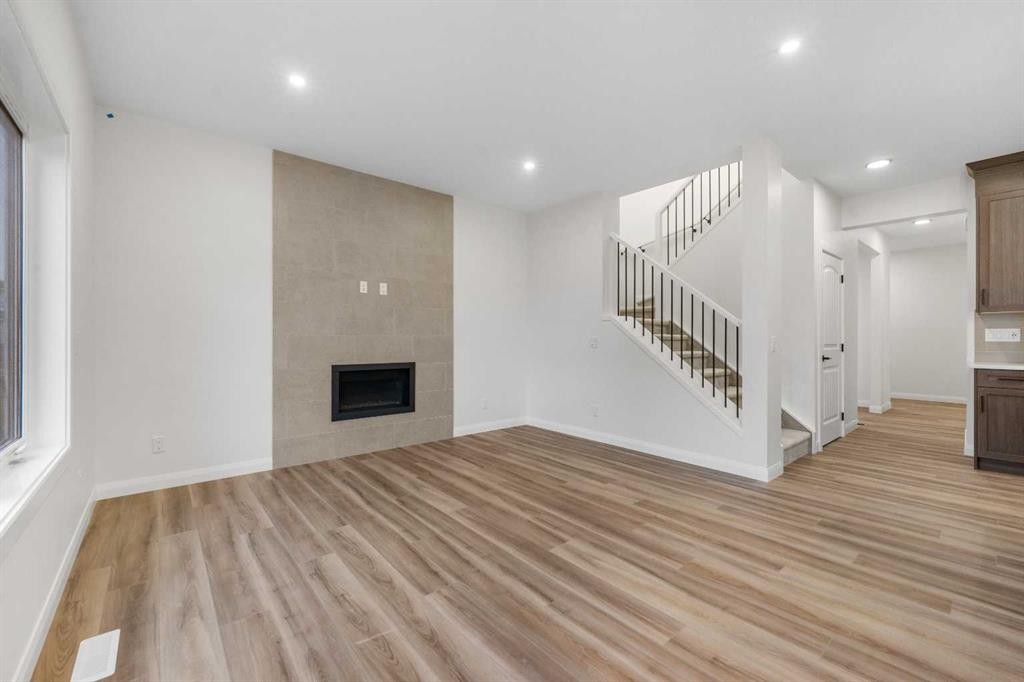 72 Dawson Wharf Mount, Chestermere, AB - Indoor With Fireplace