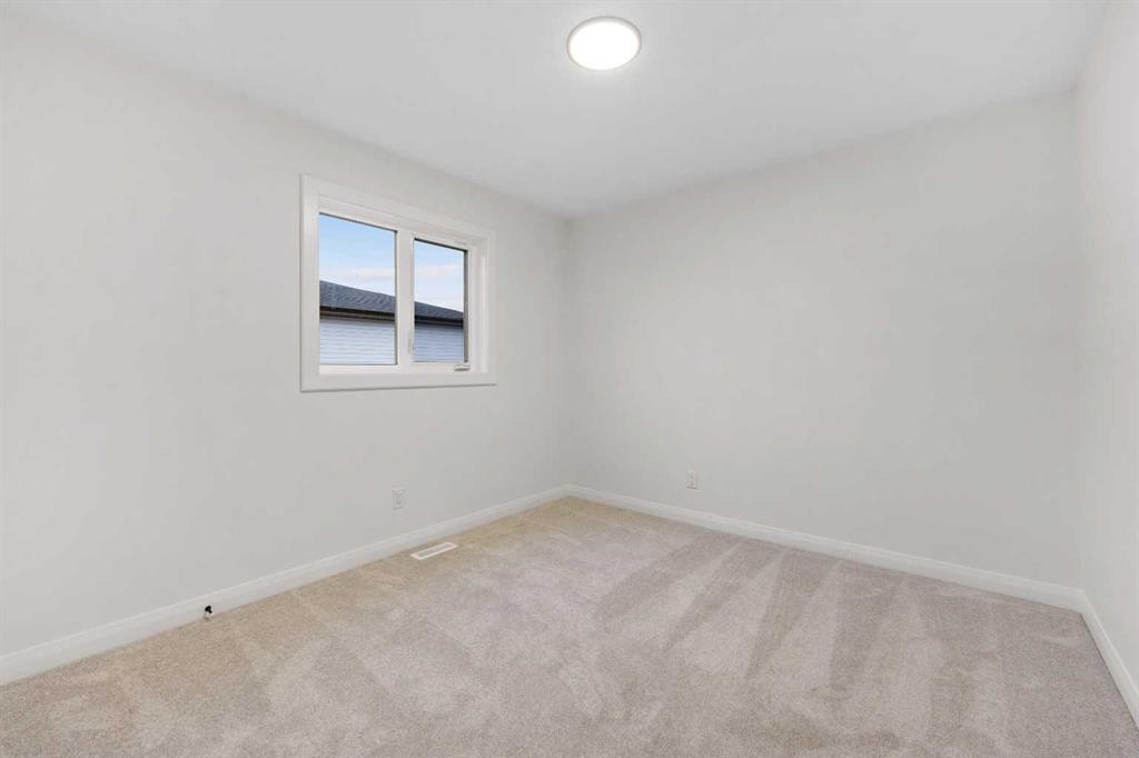 72 Dawson Wharf Mount, Chestermere, AB - Indoor Photo Showing Other Room