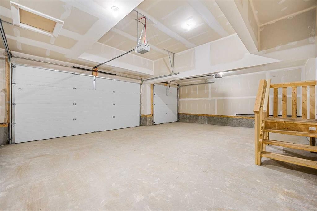 72 Dawson Wharf Mount, Chestermere, AB - Indoor Photo Showing Garage