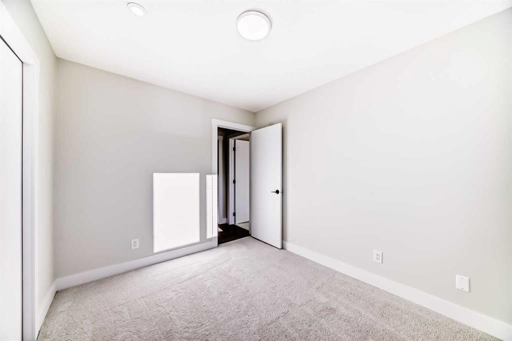 116 Rundlecairn Rise Ne, Calgary, AB - Indoor Photo Showing Other Room