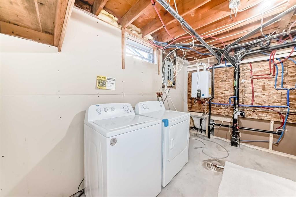 116 Rundlecairn Rise Ne, Calgary, AB - Indoor Photo Showing Laundry Room