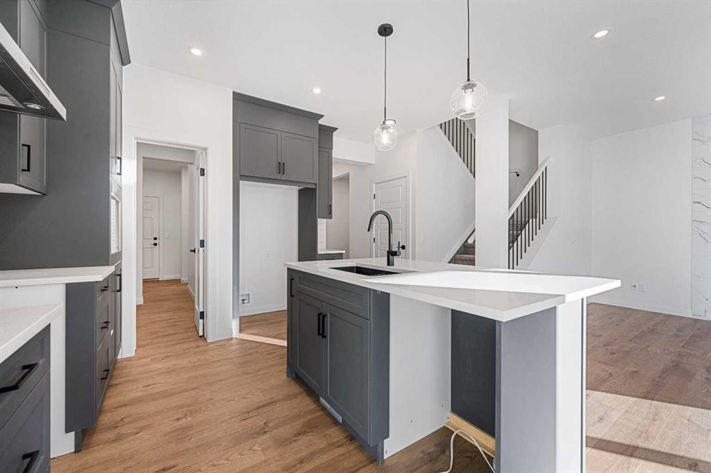 95 Dawson Wharf Mount, Chestermere, AB - Indoor Photo Showing Kitchen With Upgraded Kitchen