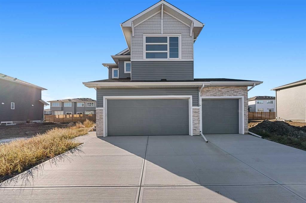 95 Dawson Wharf Mount, Chestermere, AB - Outdoor With Exterior