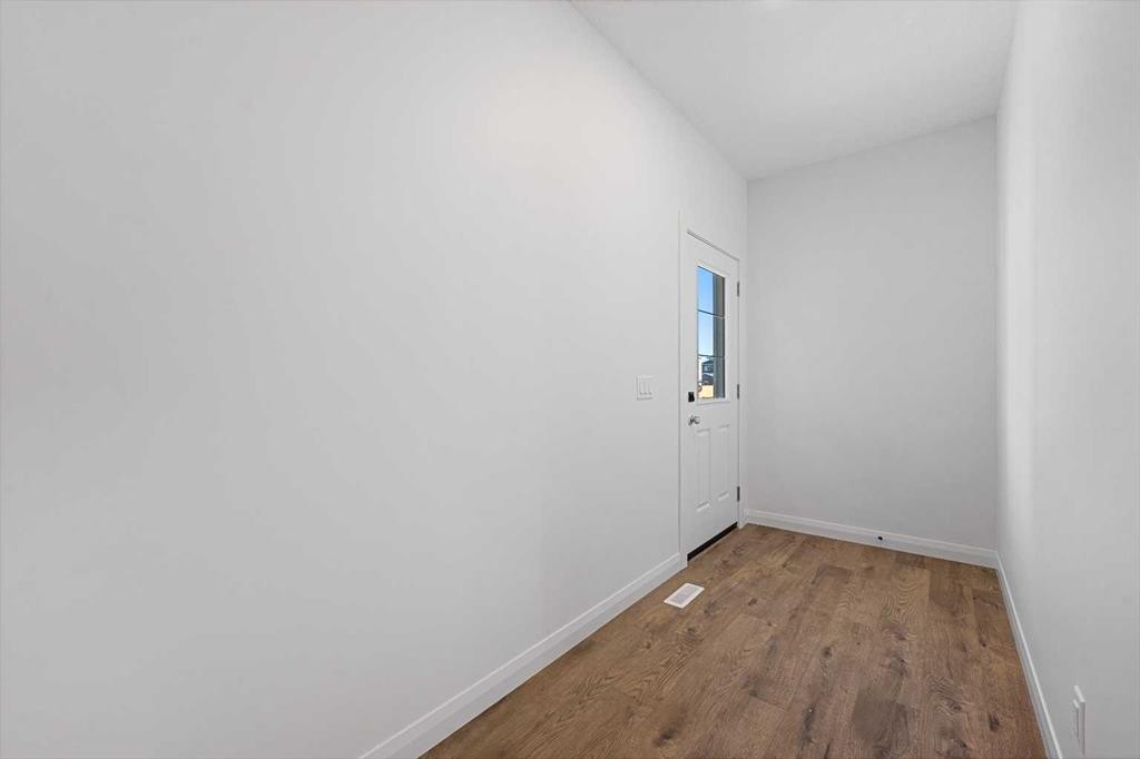 95 Dawson Wharf Mount, Chestermere, AB - Indoor Photo Showing Other Room