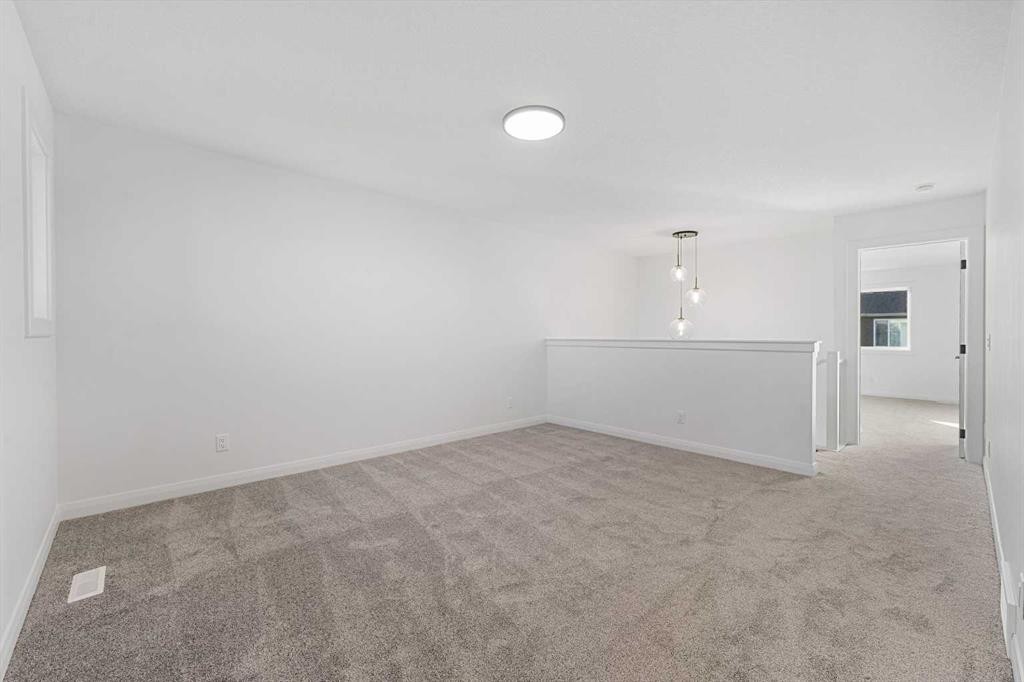95 Dawson Wharf Mount, Chestermere, AB - Indoor Photo Showing Other Room