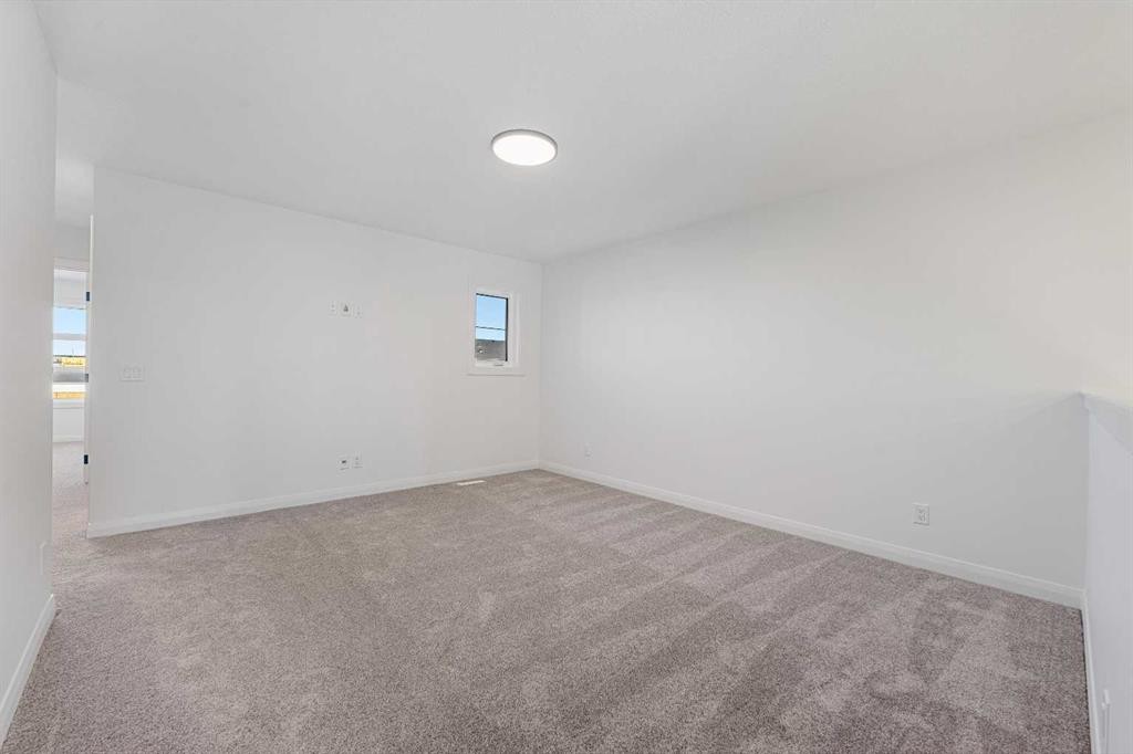 95 Dawson Wharf Mount, Chestermere, AB - Indoor Photo Showing Other Room