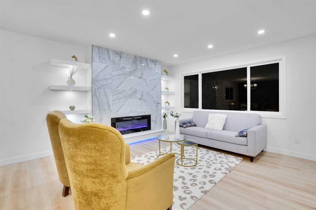 52 Franklin Drive Se, Calgary, AB - Indoor Photo Showing Living Room With Fireplace