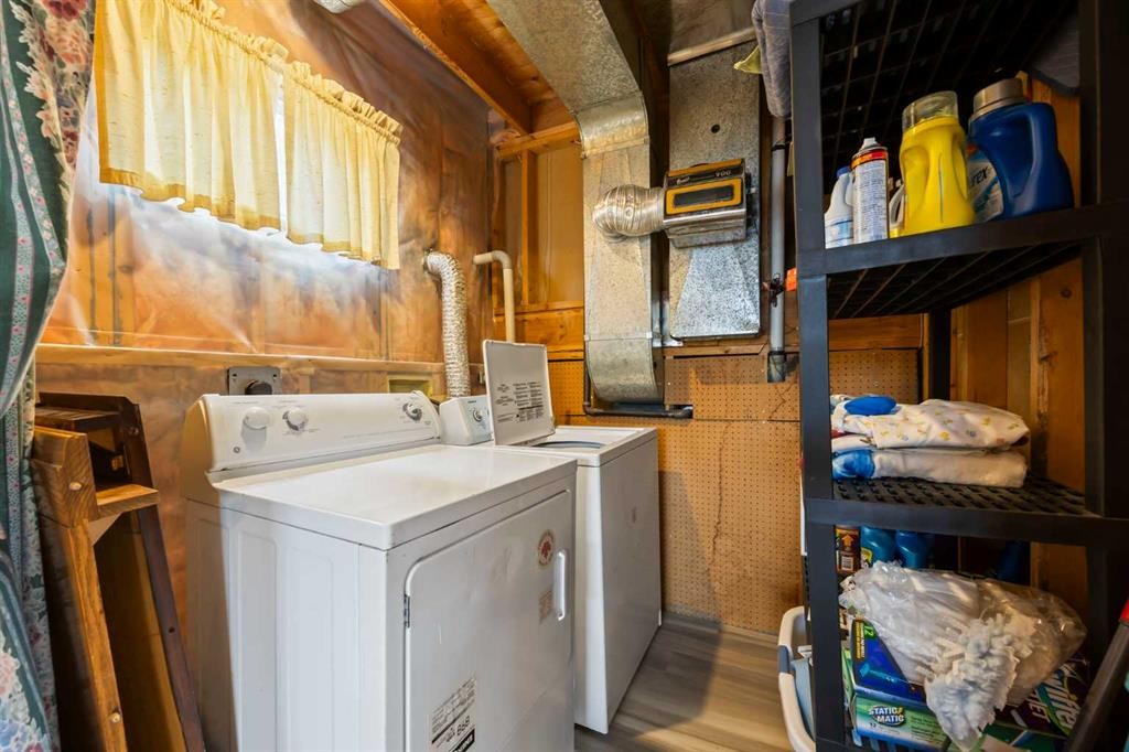 44 Taraglen Place Ne, Calgary, AB - Indoor Photo Showing Laundry Room