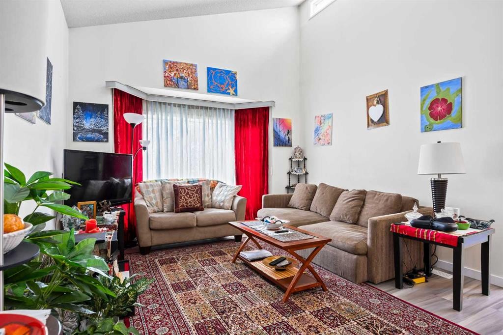44 Taraglen Place Ne, Calgary, AB - Indoor Photo Showing Living Room