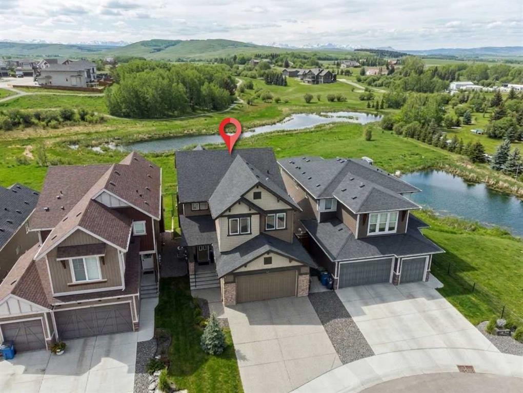 67 Fireside Terrace, Cochrane, AB - Outdoor With Facade