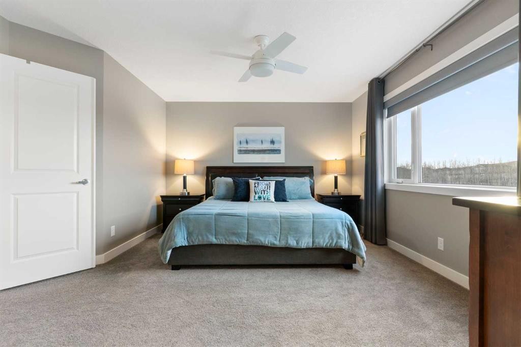 67 Fireside Terrace, Cochrane, AB - Indoor Photo Showing Bedroom