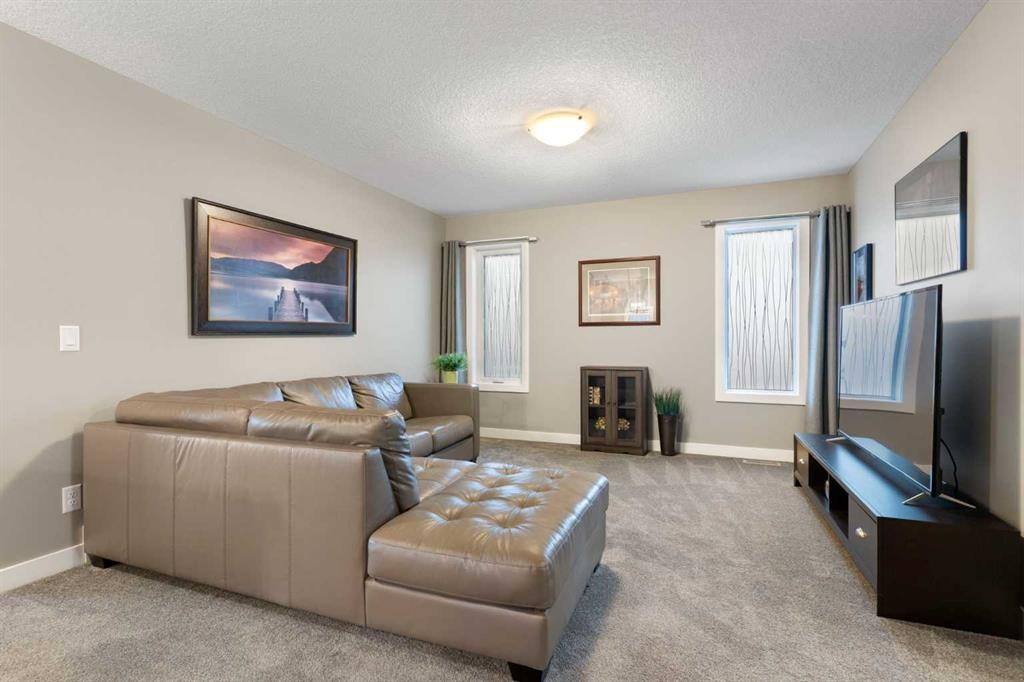 67 Fireside Terrace, Cochrane, AB - Indoor Photo Showing Living Room