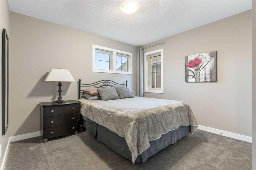 67 Fireside Terrace, Cochrane, AB - Indoor Photo Showing Bedroom