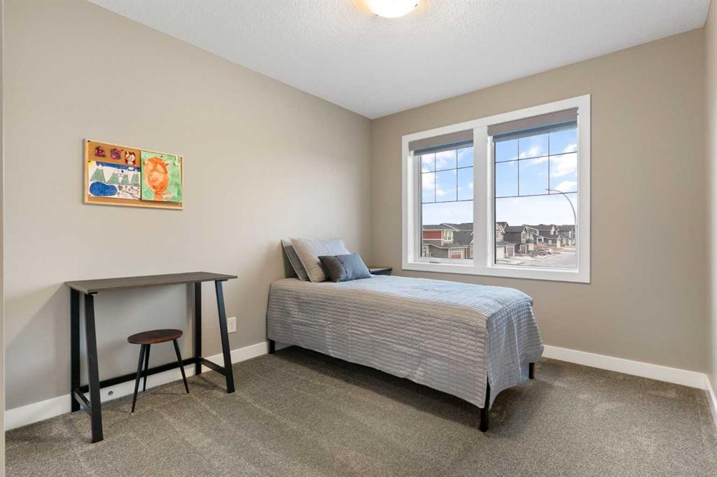 67 Fireside Terrace, Cochrane, AB - Indoor Photo Showing Bedroom