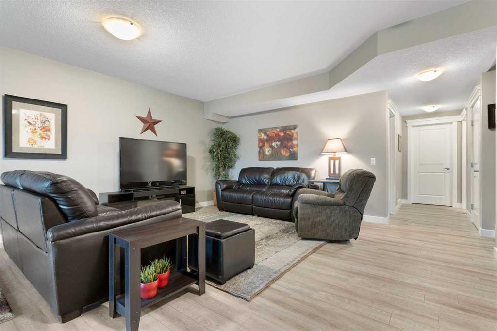 67 Fireside Terrace, Cochrane, AB - Indoor Photo Showing Living Room