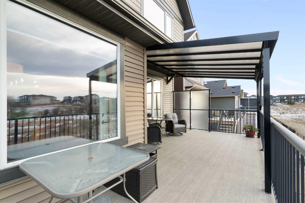 67 Fireside Terrace, Cochrane, AB - Outdoor With Deck Patio Veranda With Exterior